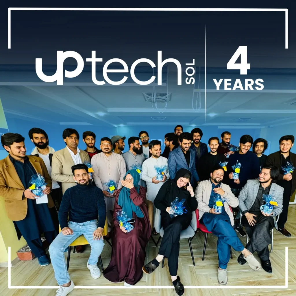 Uptech Sol 4 Years anniversary graphic with a group photo of the team